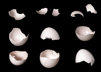 Aufkleber - set of egg parts with cracks isolated on black background