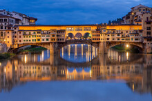 Ponte Vecchio Bridge Over Arno River At Night, Florence, Italy
