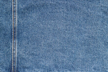 Texture Of Blue Jeans Denim Fabric With Seam Background	