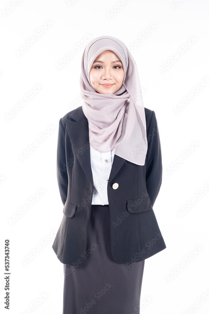 Portrait of Muslim woman in office attire and wearing a hijab. Asian woman in a corporate world. Formal corporate outfit and elegant appearance. Corporate or business people concept. Isolated Stock Ph...