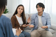 © Pormezz - couple relationship therapy with a counselor. Close Up hands of the woman client during a conversation with psychologist to find problems and solution.