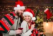 © be free - Romantic couple. Family celebrate winter holiday at home. Romantic evening. Christmas ideas for couples. Romantic date with red wine. Man and woman in love cuddling enjoy intimacy festive atmosphere