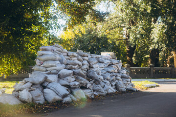 sandbags for protection near the road, war