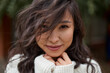© olga pink - Beautiful asian kazakh brunette woman with flying long hair