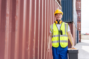 Wall Mural - Portrait of Caucasian man worker working in container port terminal. 