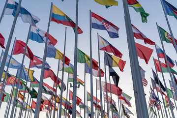 Wall Mural - Flags of the different countries against the blue sky