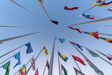 Wall Mural - Flags of the different countries against the blue sky