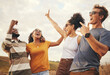 © S Fanti/peopleimages.com - Friends, freedom and fun with a man and woman group laughing or joking while on summer vacation in nature. Happy, funny and fun with friendship, travel and affection between young people outdoor