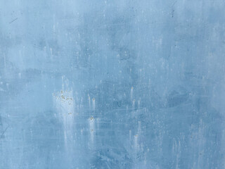 Blue and white painted grunge cracked wall with texture for background.