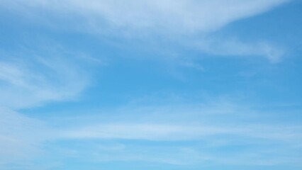 Wall Mural - 4K sky timelapse : amazing white clouds floating in the blue sky. meteorology concept. clouds background. nature stock footage
