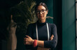 © Jacob Lund - Portrait of a confident female fashion designer standing in her studio