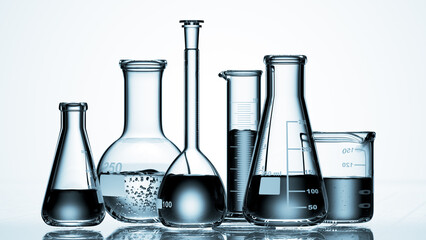 Wall Mural - glass chemistry lab equipment on blue background. chemistry lab concept. 3d