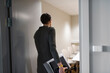 © Johnér - Businesswoman entering boardroom