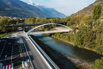 aerial view of bridge with bike path and road signs