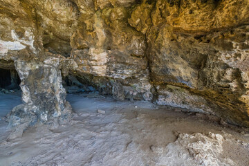 Beautiful view of mountain cave on ocean coastline. Aruba. 