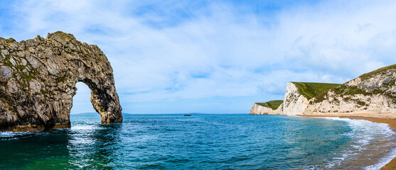 Sticker - Durdle Door on the Jurrassic Coast in Dorset, England, UK; seascape natural landscape with rocks and while cliffs on the beach