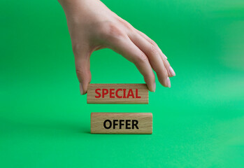 Special offer symbol. Concept word Special offer on wooden blocks. Beautiful grey background. Businessman hand. Business and Special offer concept. Copy space