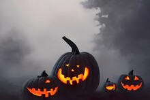 There Are Four Pumpkins Stacked On Top Of Each Other. The Bottom Pumpkin Is The Largest And The Top Pumpkin Is The Smallest. All Of The Pumpkins Have Scary Faces With Big Eyes And Mouths Carved Into T