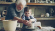 © silverkblack - Concentrated little boy is learning to work with clay on professional throwing-wheel in pottery class in traditional workshop. His teacher senior experienced man is helping him.