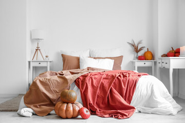 Poster - Interior of cozy bedroom with pumpkins and tables