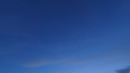 Wall Mural - Sunset timelapse. Galaxy view. Daylight period. Deep blue evening sky changing to dark night fast motion.