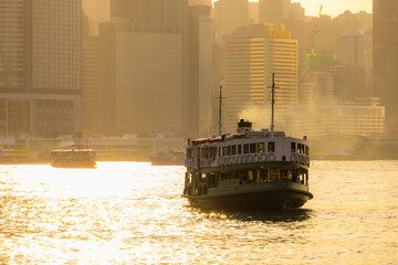 Fototapete - Public ferry cross the Victoria harbor in Hong Kong
