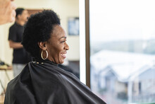 Black Woman At The Hairdresser's. 