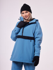 Skier happy caucasian satisfied smiling woman 20s wear warm padded windbreaker jacket ski.