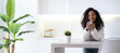 Banner African American Girl using smartphone pressing finger in modern kitchen at home, reading social media internet, typing text or shopping online Mobile phone in two black hands, copyspace