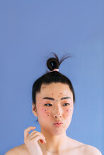 Asian Woman With Glitters 