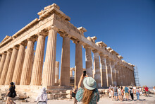 Woman Taking Photo Of Parthenon