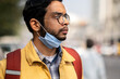 © Dream Lover/Stocksy - Portrait of an Indian man wearing yellow denim jacket at outdoors