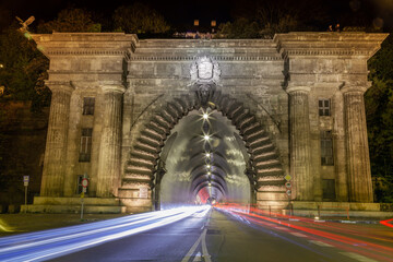 Wall Mural - Buda Castle Tunnel at night with car movement trail blurred, Budapest, Hungary