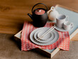 © Andrew Urwin/Stocksy - Japanese tea set and plates