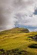 © Marcos Osorio/Stocksy - Green mountain in the Faroe Islands