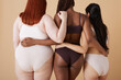 © Leire Cavia/Stocksy - Detail crop of Female Friends In Underwear