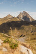 © Blue Collectors/Stocksy - A mountain peak in summer
