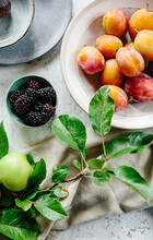 Seasonal Fruit Including Blackberries And Apples.