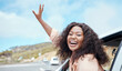 © Anela R/peopleimages.com - Travel, road trip and excited black woman in window portrait for adventure journey, countryside lifestyle or outdoor holiday. Transportation car, happy person driving and sky cloud mockup background