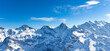 © SASITHORN - The beautiful view of snow-capped mountain peaks of  Swiss Mountain against the blue sky background