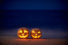 Halloween Pumpkins Jack P Lantern On The Sea Beach At Night In The Bright Moonlight