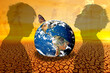 The concept of loving the earth, protecting the environment, changing the environment. globe on a barren land