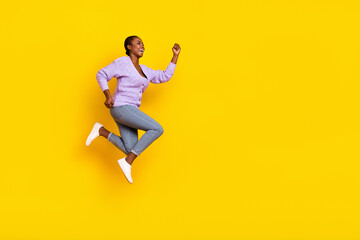 Sticker - Full length profile portrait of active sporty lady run jump look empty space isolated on yellow color background