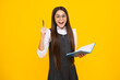 © Olena - Teenager school girl with books isolated studio background. Surprised face, surprise emotions of teenager girl.
