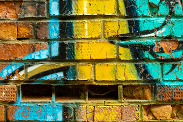 Wall Mural - Background with part of a painted brick wall. Abstract bright template for a cover on an informal and youth theme.