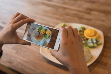 Wall Mural - taking photo at breakfast