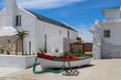 view from the streets of Paternoster with an old boat for decoration