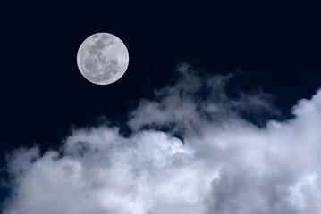 Wall Mural - Full moon with clouds in the sky.