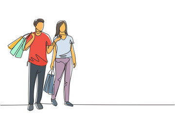 Poster - One single line drawing young happy romantic couple walking and shopping together while holding paper bags at mall. Commercial retail shopping concept. Continuous line draw design illustration