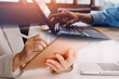 © ARMMY PICCA - businesswoman hand working with laptop computer, tablet and smart phone in modern office with virtual icon diagram at modernoffice in morning light